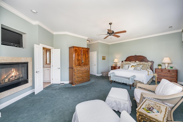 bedroom featuring ceiling fan, carpet flooring, a high end fireplace, baseboards, and ornamental molding