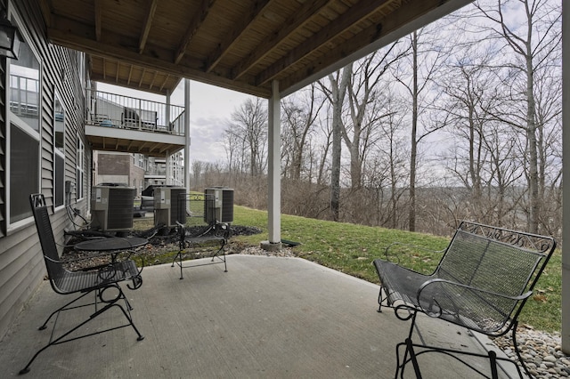 view of patio featuring stairs and central air condition unit