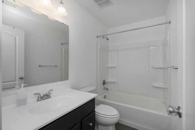 bathroom featuring visible vents,  shower combination, vanity, and toilet