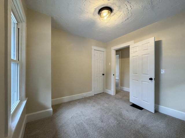 1307 Highway Ave, Covington, KY 41011 - unfurnished bedroom with carpet and a closet