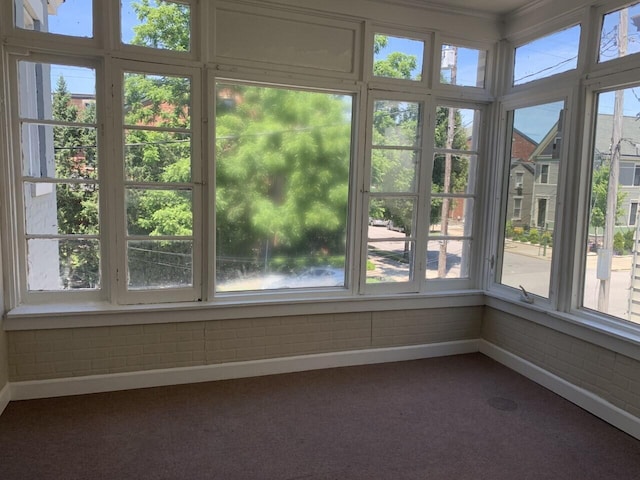 view of unfurnished sunroom