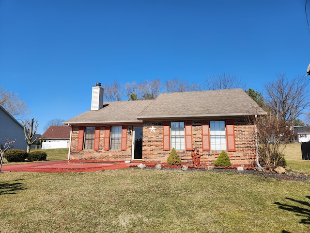 ranch-style house with a front yard, brick siding, roof with shingles, and a chimney