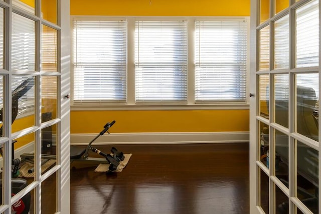 sunroom featuring french doors