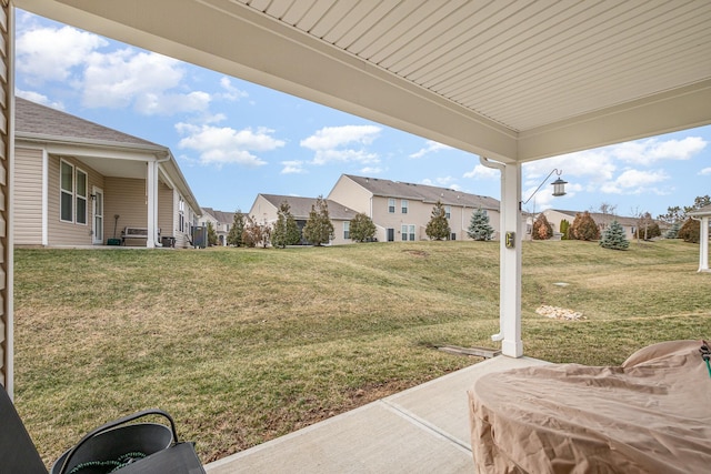 view of yard with a residential view