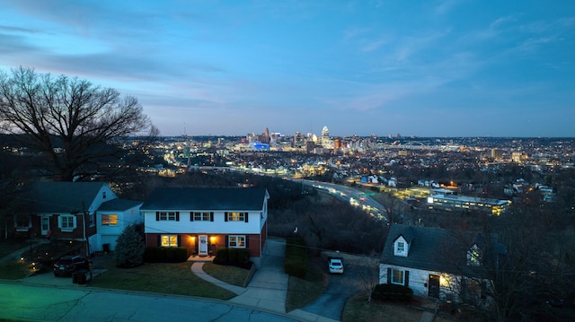 aerial view at dusk with a city view