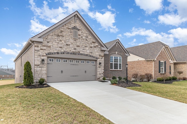 view of front facade with driveway, a garage, roof with shingles, a front yard, and brick siding