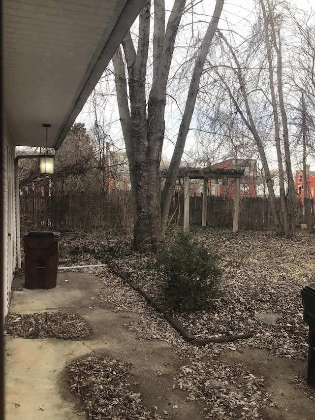 view of yard featuring fence