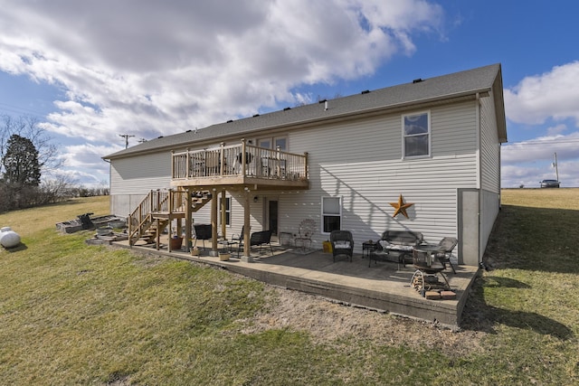 rear view of property with a yard, a patio, a deck, and stairs