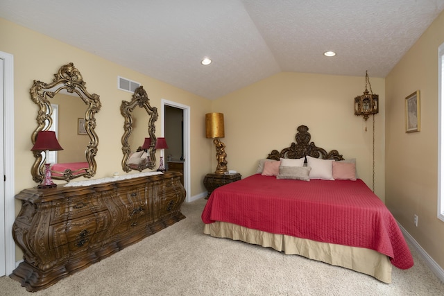 bedroom with carpet, visible vents, vaulted ceiling, a textured ceiling, and baseboards