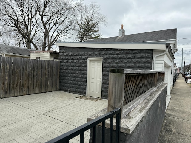 view of patio with fence