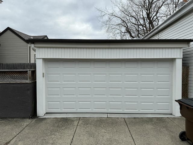 garage with fence