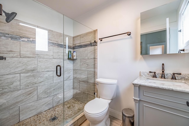 639 Watkins St, Covington, KY 41011 - bathroom with vanity, a stall shower, and wood finished floors