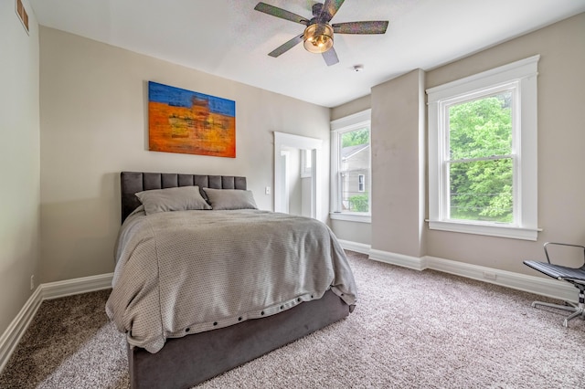 639 Watkins St, Covington, KY 41011 - carpeted bedroom featuring multiple windows and a ceiling fan