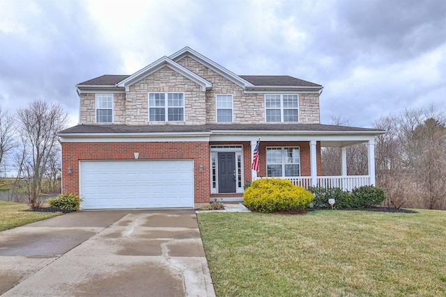 view of front of house with an attached garage, covered porch, brick siding, concrete driveway, and a front yard