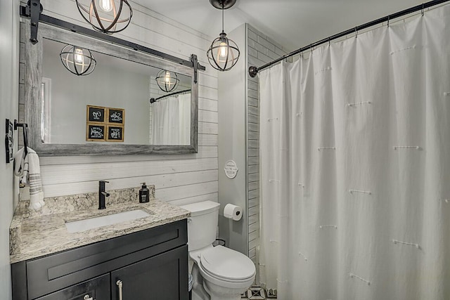 full bathroom with wood walls, toilet, vanity, and a shower with curtain