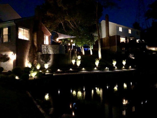 view of yard at night