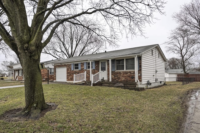 single story home featuring a garage, brick siding, fence, and a front lawn