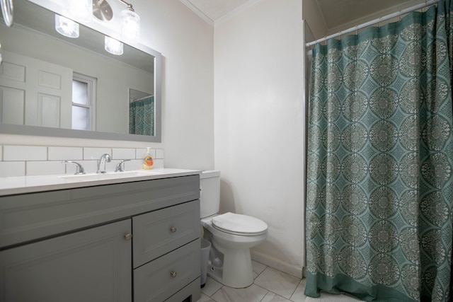 full bath with vanity, ornamental molding, tile patterned floors, toilet, and tasteful backsplash