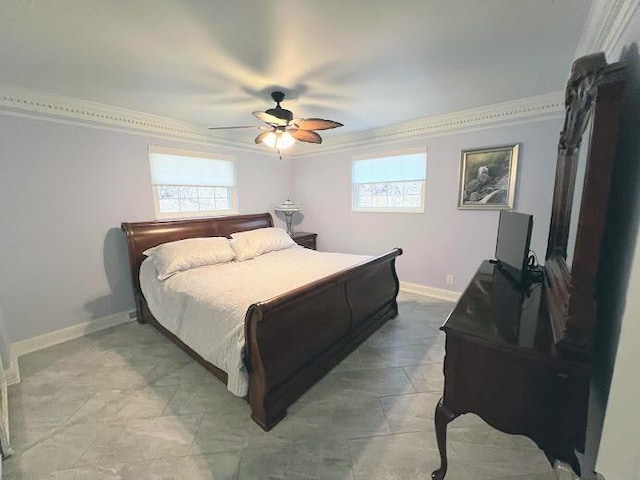 bedroom featuring baseboards, a ceiling fan, and crown molding