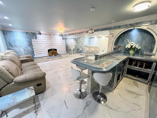 bar with marble finish floor, ornamental molding, and recessed lighting