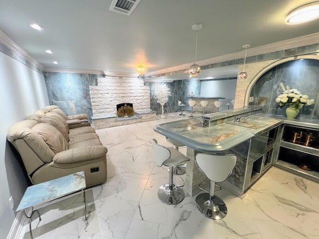 interior space featuring recessed lighting, a sink, visible vents, marble finish floor, and crown molding