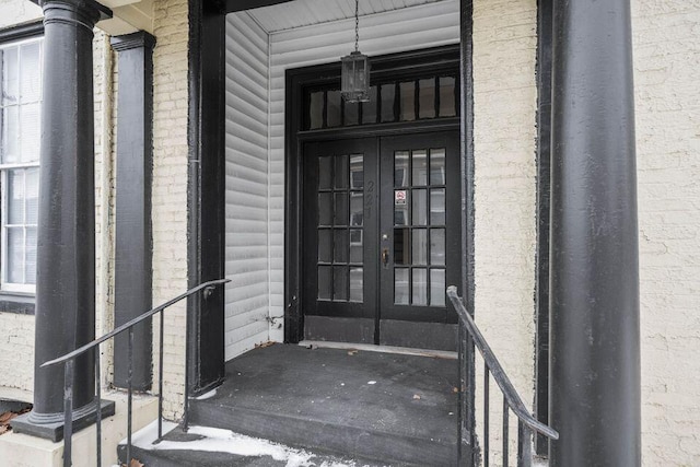 doorway to property featuring french doors