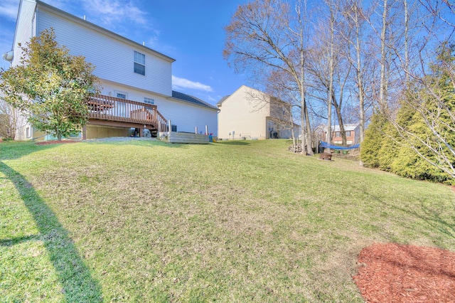 view of yard with a deck