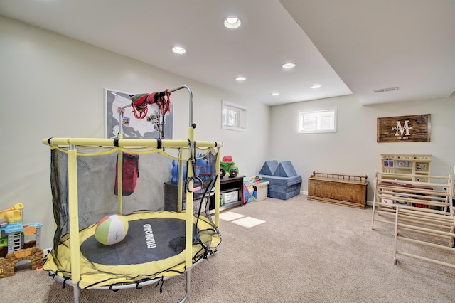 playroom featuring carpet flooring, recessed lighting, visible vents, and baseboards