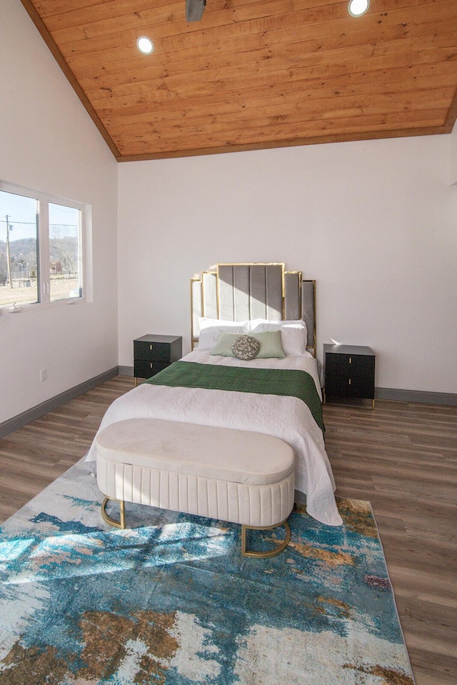 bedroom with wooden ceiling, baseboards, vaulted ceiling, and wood finished floors