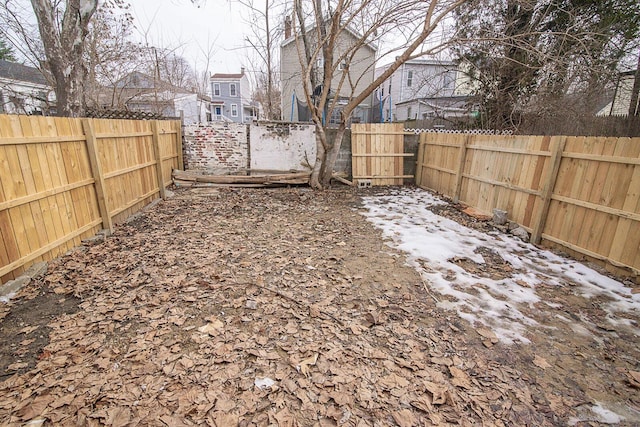 view of yard featuring a fenced backyard