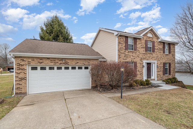 colonial house with a front lawn, an attached garage, brick siding, and driveway