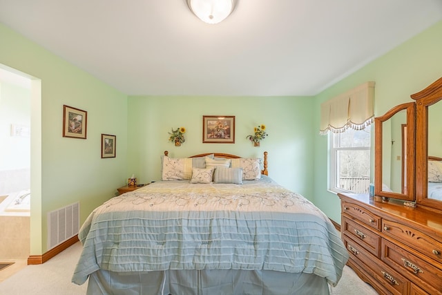 bedroom featuring light carpet and visible vents