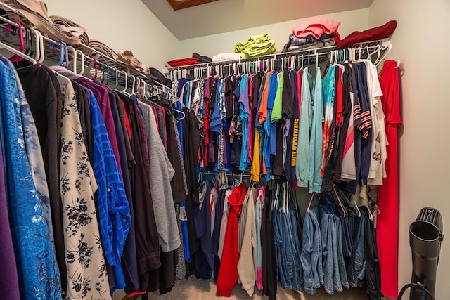 spacious closet featuring carpet floors