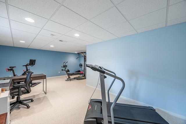 exercise area with recessed lighting, carpet, a drop ceiling, and baseboards