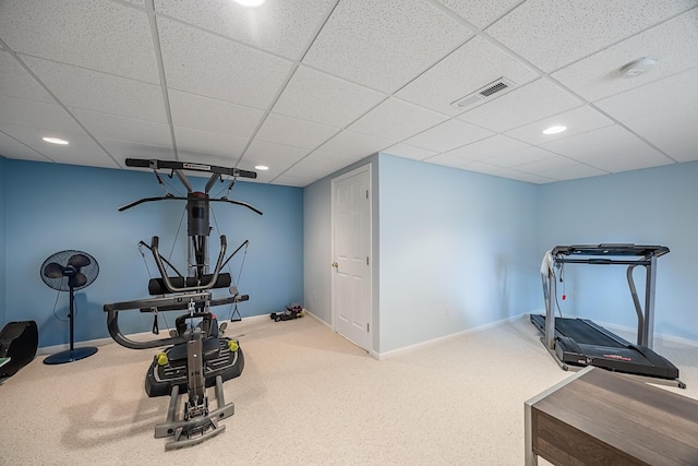 exercise room with recessed lighting, visible vents, a drop ceiling, and baseboards