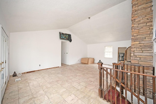 bonus room with vaulted ceiling