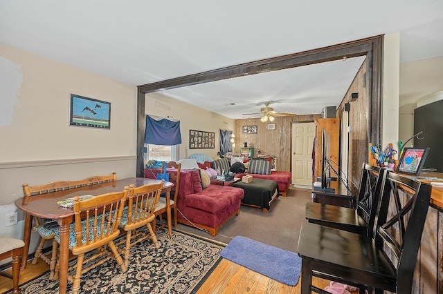 interior space featuring ceiling fan and wood finished floors