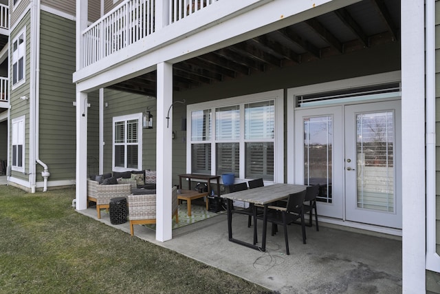 view of patio with outdoor dining space, french doors, and outdoor lounge area