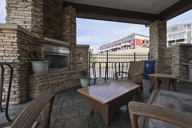 view of patio / terrace featuring fence