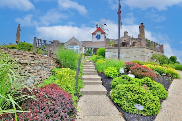 view of property's community featuring stairway