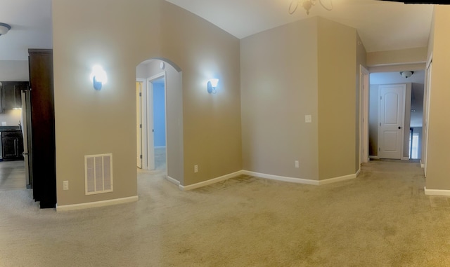 7461 Flintshire Dr, Alexandria, KY 41001 - empty room featuring arched walkways, carpet, visible vents, and baseboards