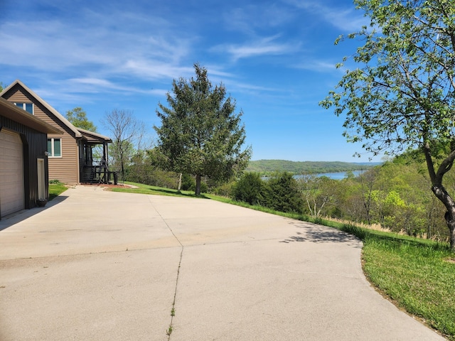 view of patio featuring a water view