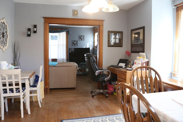 dining area with light wood-style floors