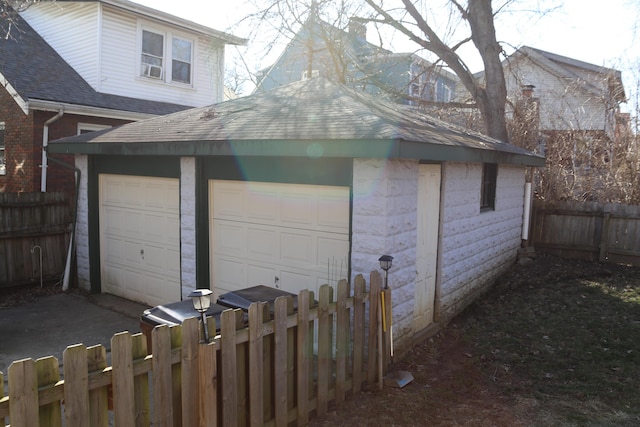 garage featuring fence