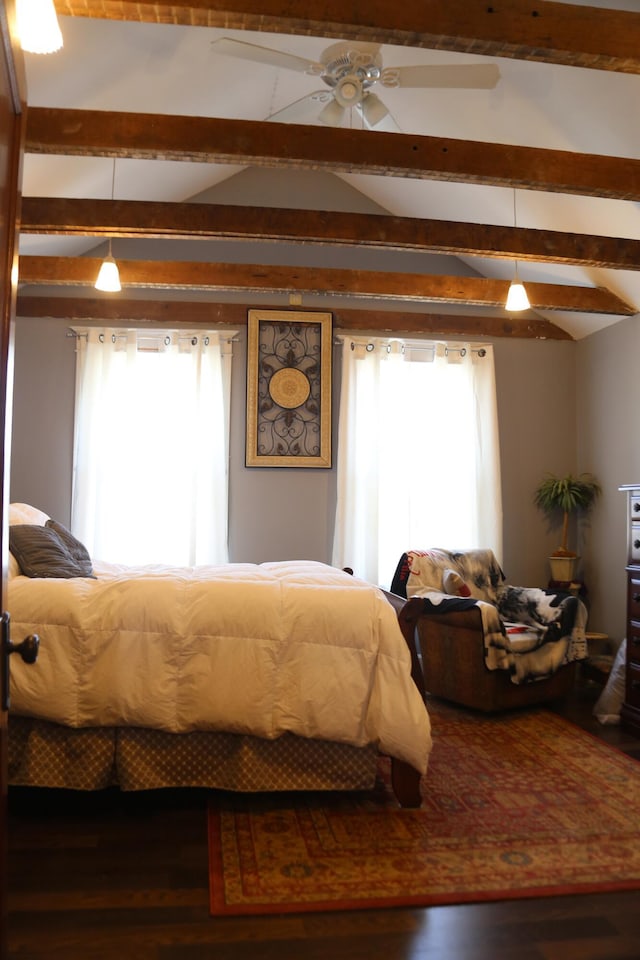 bedroom featuring lofted ceiling with beams