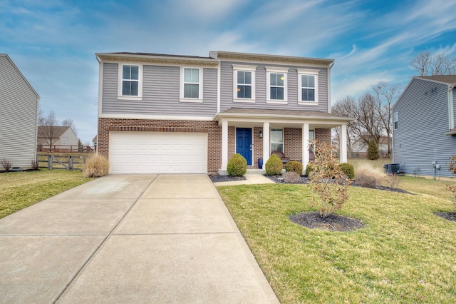 view of front facade featuring concrete driveway, brick siding, a front yard, and fence