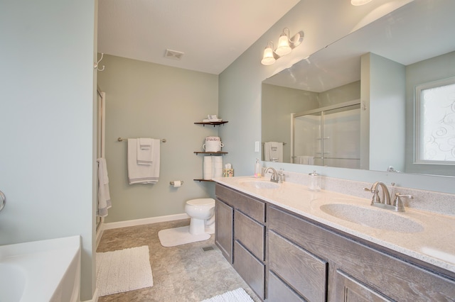 bathroom featuring a stall shower, baseboards, visible vents, and a sink