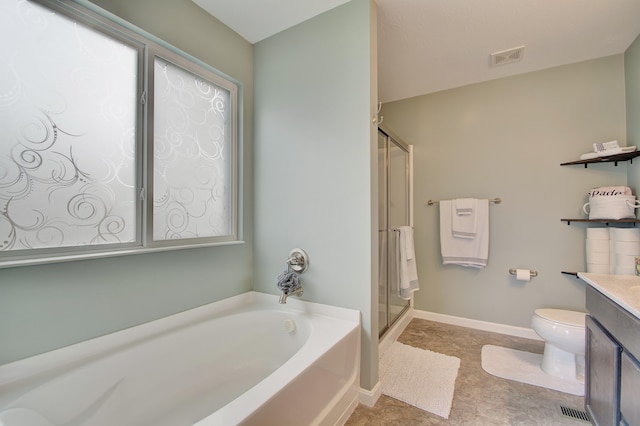 bathroom featuring a stall shower, baseboards, toilet, a garden tub, and vanity