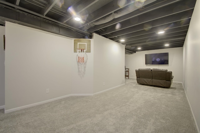 finished basement with baseboards and carpet flooring