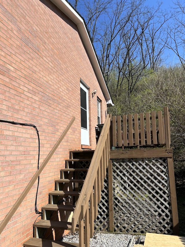 wooden deck featuring stairs